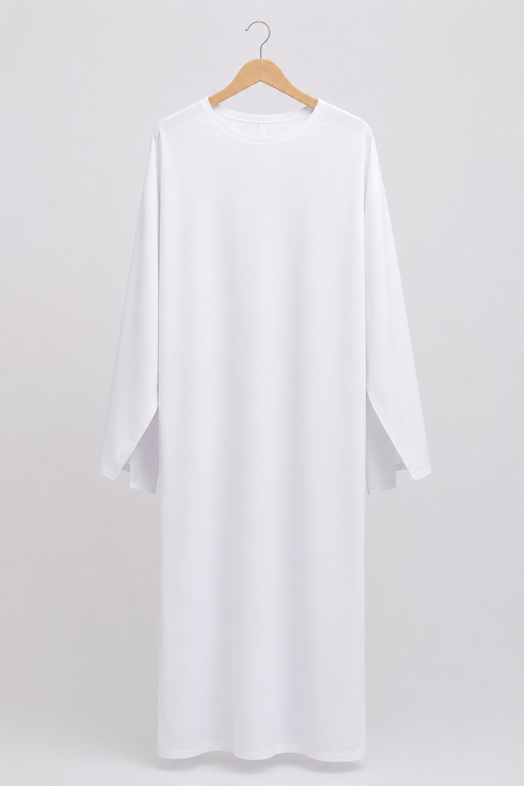 White full-length long-sleeve inner abaya included with the Jolie Nisa four-piece floral kimono set.