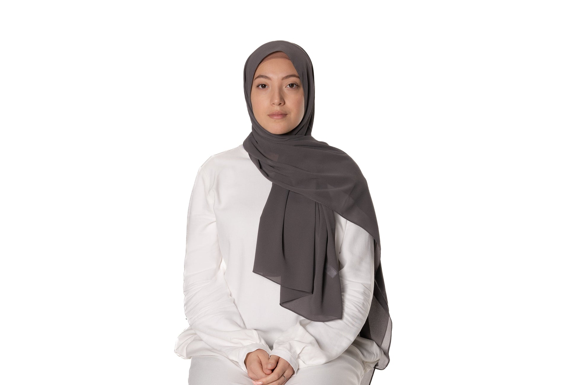 Jolie Nisa Hijab Dark Grey Elevate your style with the Non-Slip Bubble Chiffon Hijab by Jolie Nisa. With its comfortable and secure fit, this hijab is perfect for any occasion. Shop now! Jolie Nisa Non-Slip Premium Bubble Chiffon Hijab for All-Day Comfort 