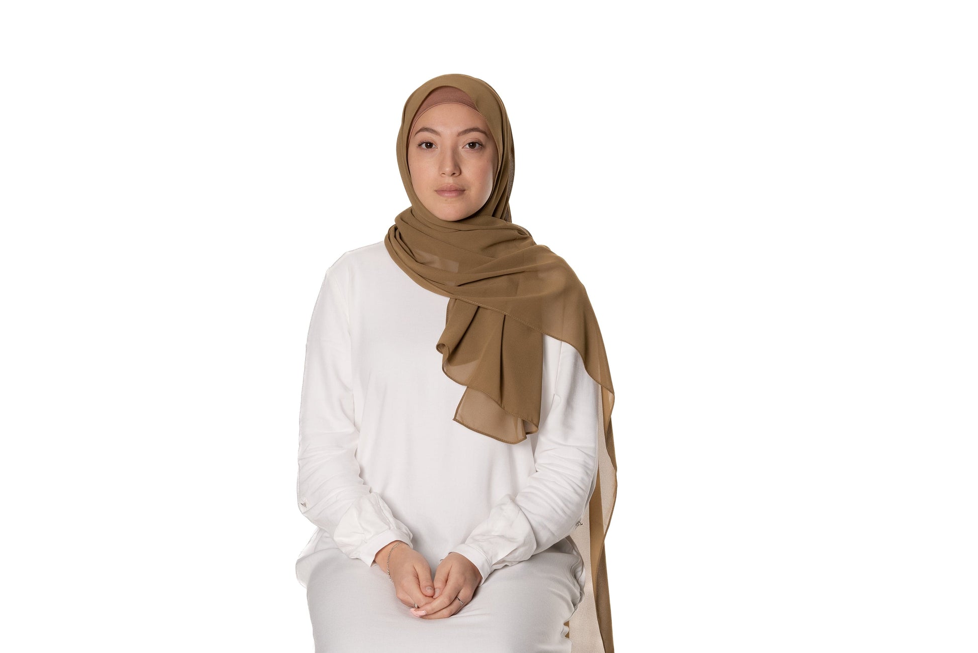Jolie Nisa Hijab Henna Elevate your style with the Non-Slip Bubble Chiffon Hijab by Jolie Nisa. With its comfortable and secure fit, this hijab is perfect for any occasion. Shop now! Jolie Nisa Non-Slip Premium Bubble Chiffon Hijab for All-Day Comfort 