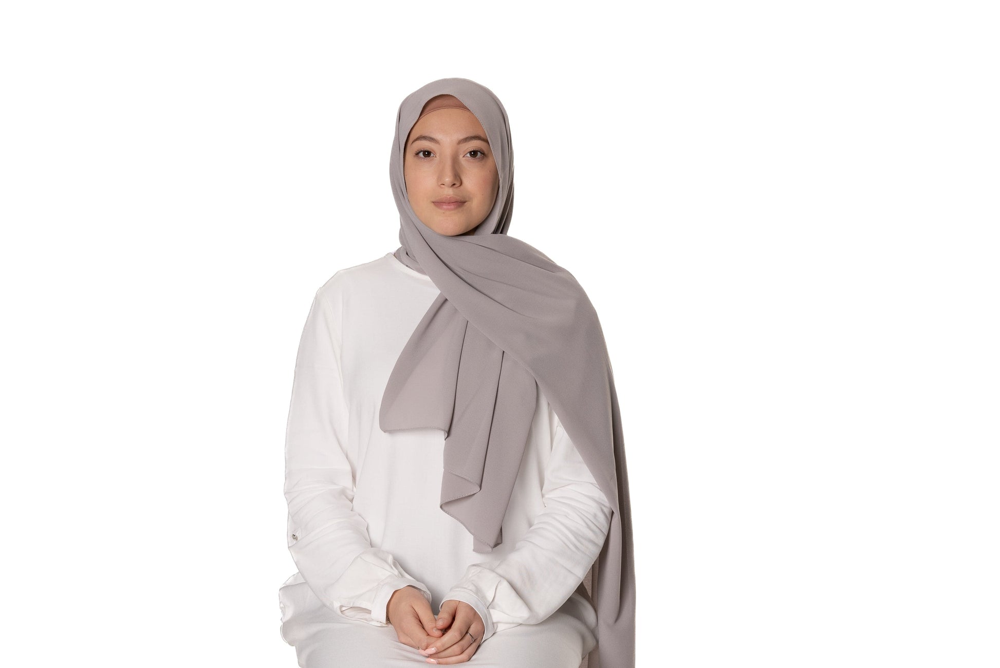 Jolie Nisa Hijab Light Grey Elevate your style with the Non-Slip Bubble Chiffon Hijab by Jolie Nisa. With its comfortable and secure fit, this hijab is perfect for any occasion. Shop now! Jolie Nisa Non-Slip Premium Bubble Chiffon Hijab for All-Day Comfort 