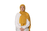 Load image into Gallery viewer, Jolie Nisa Hijab Mustard Premium Luxury Crepe Crinkle Hijab - Non-Slip and Comfortable Hijab for All Occasions Premium Luxury Crepe Crinkle Hijab, voile - Soft and Stylish Headscarf
